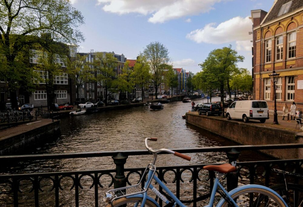 Explore the best things to do in Amsterdam: Cruise Past Canal Houses and Bridges