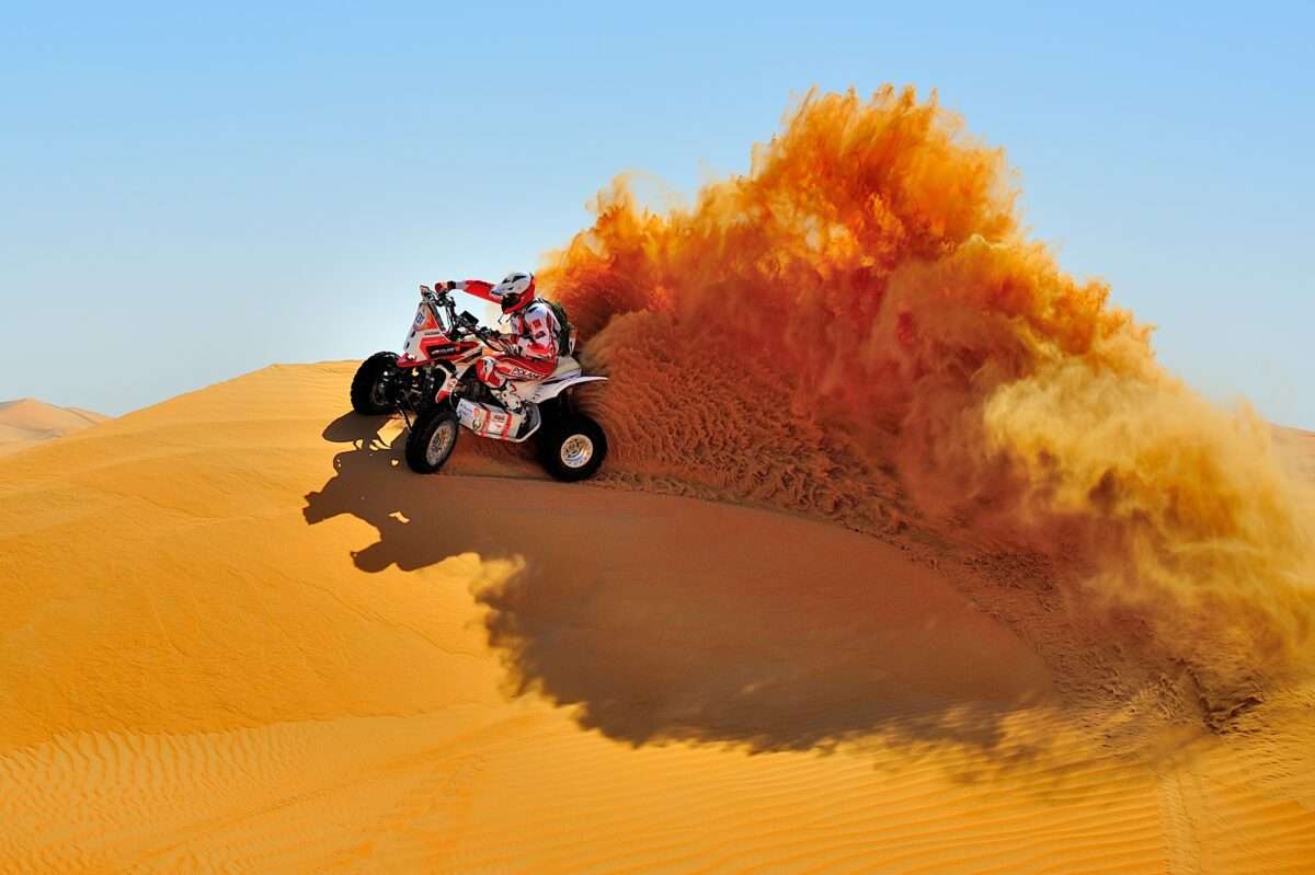 Explore the best things to do in Doha: go dune bashing in Doha, Qatar