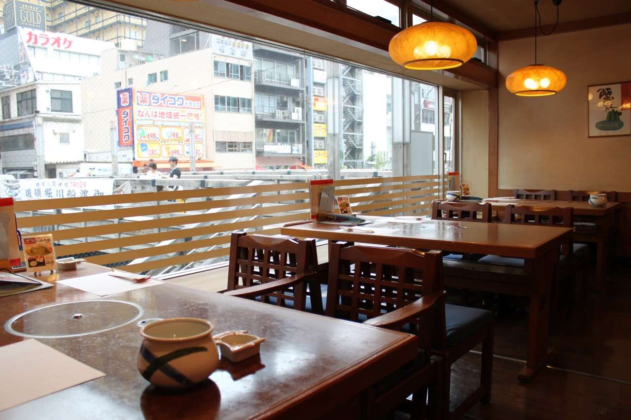 Explore the best restaurants in Osaka: Kanidouraku Dotombori-Honten 